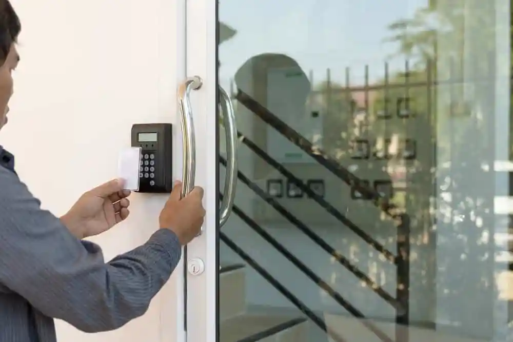 Professional commercial locksmith installing access control system in Dubai office